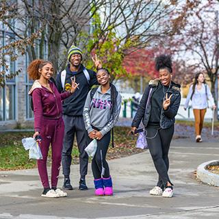 Group of students on campus in the fall